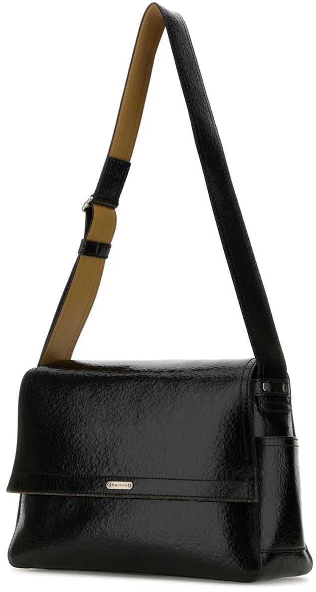 Structured Black Leather Bag with Flap Closure