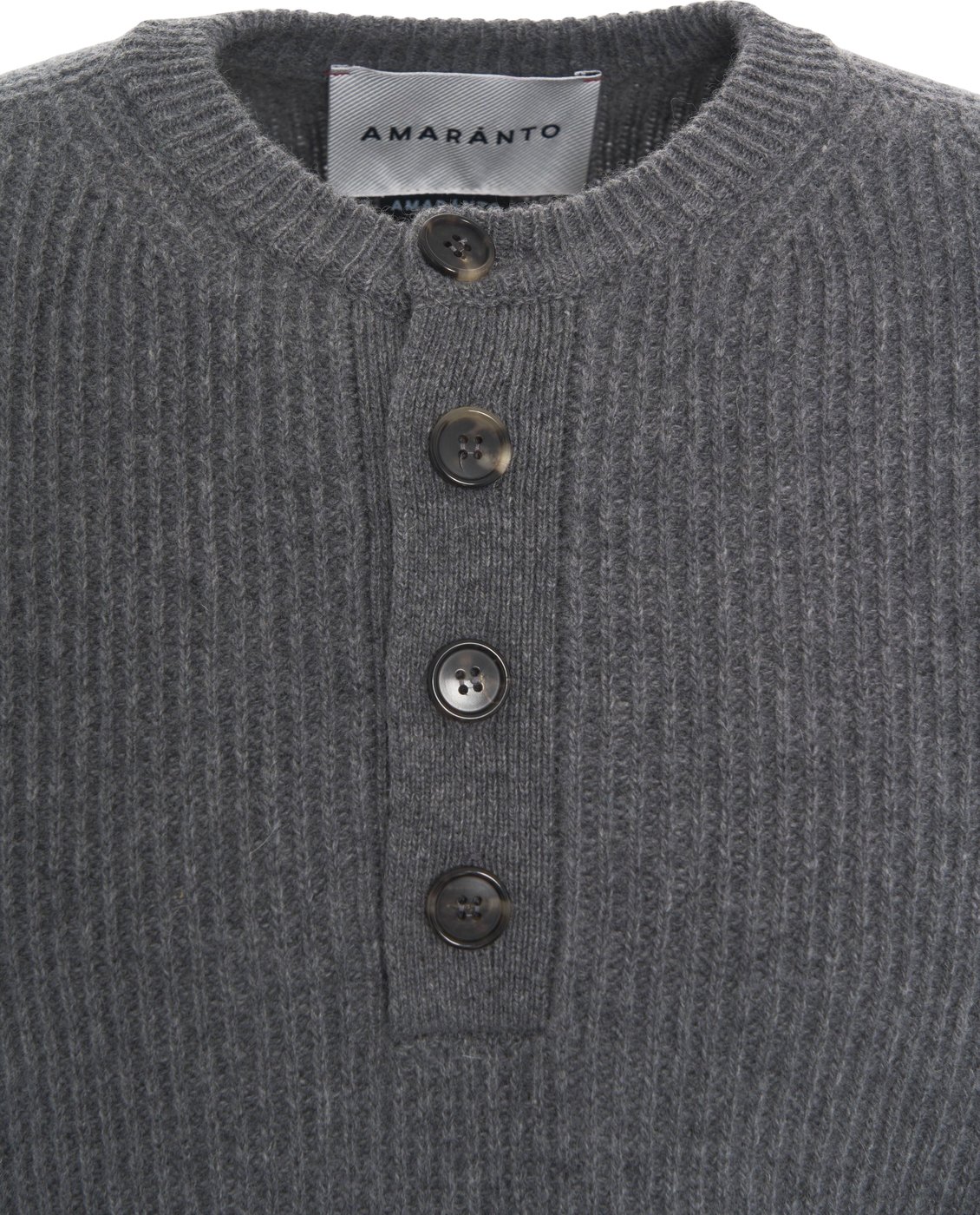 Sweater with button closure
