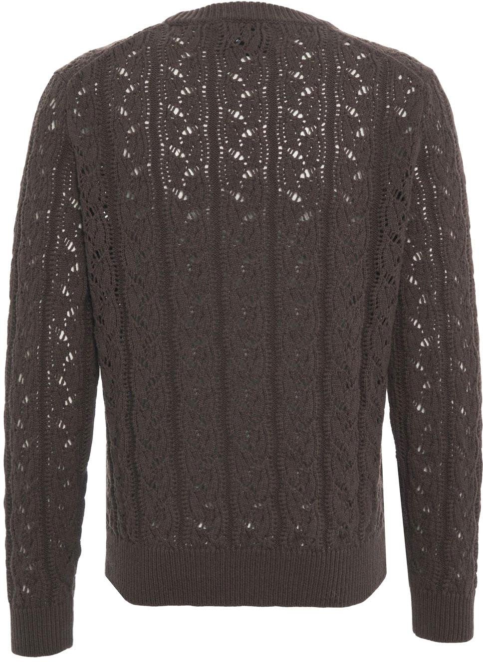 Sweater with cable knit pattern