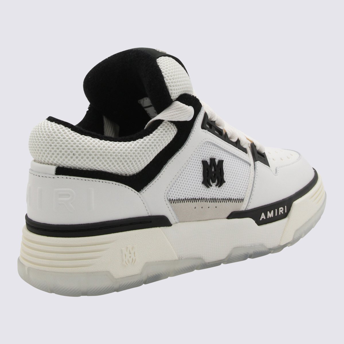 Predominantly White Sneakers with Black Accents
