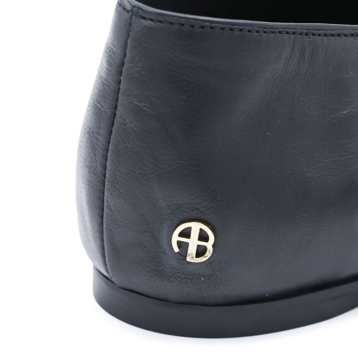 Minimalist Black Leather Flats with Subtle Logo Detail