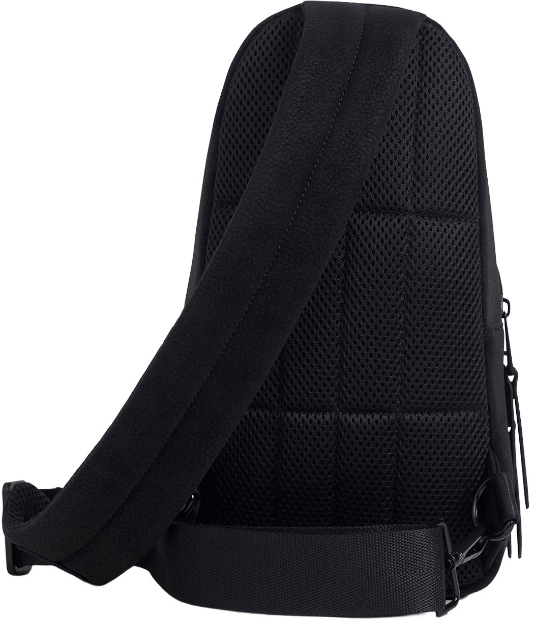 Black sling backpack in nubuck faux leather with metal zip pockets, 3D logo and adjustable strap