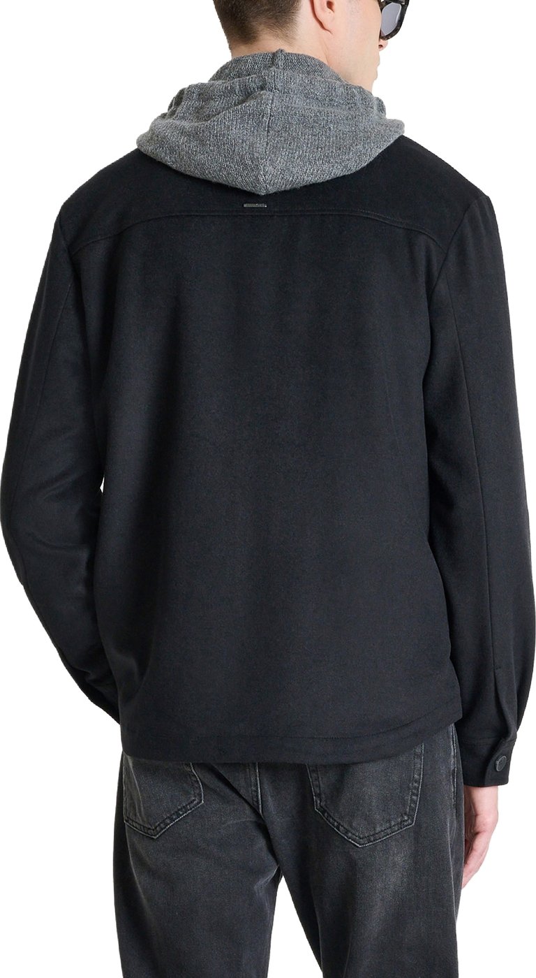 Black relaxed-fit coat in melton wool with logo on metal badge