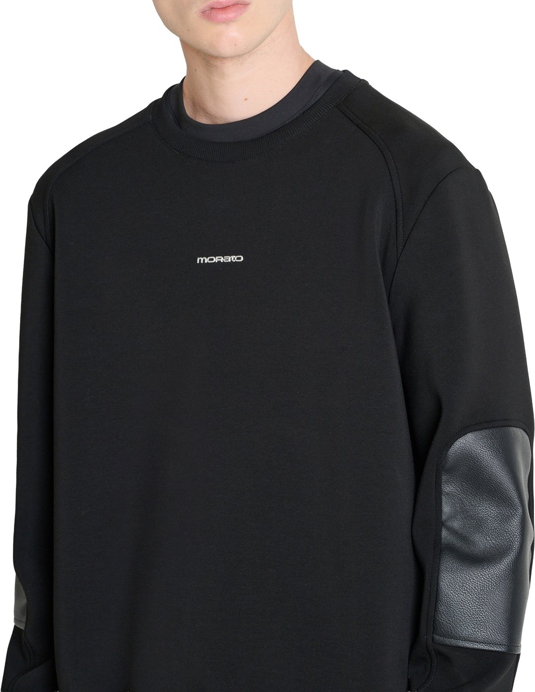 Black relaxed-fit sweatshirt with contrast faux leather inserts and logo print on front