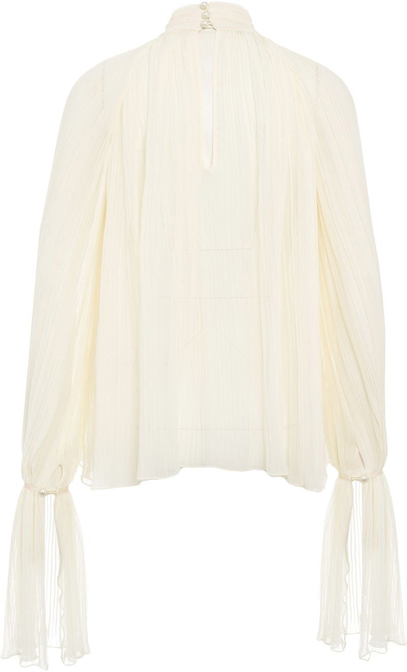 Blouse with pleated folds