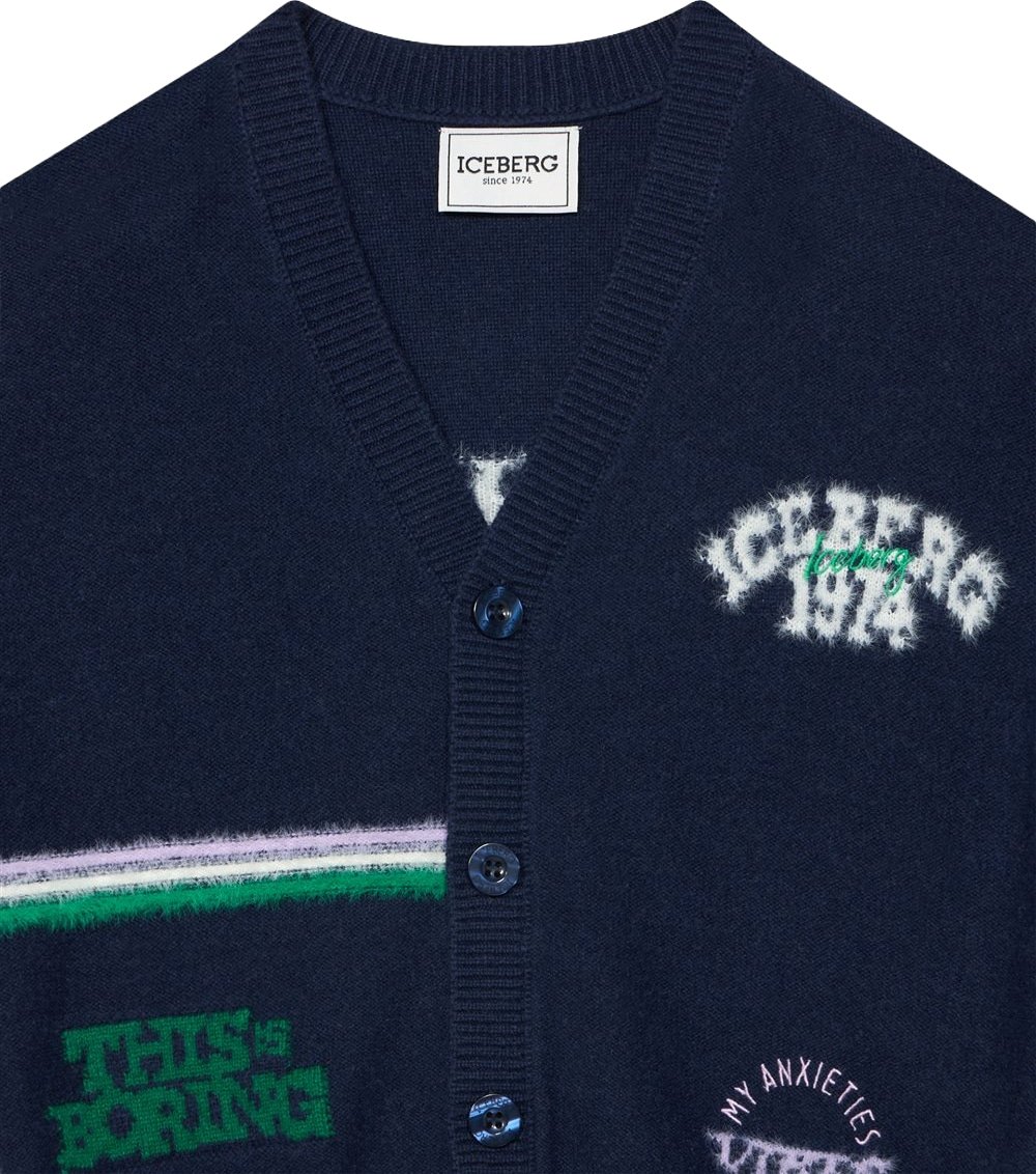 Girls' navy blue knitted cardigan with varsity graphics