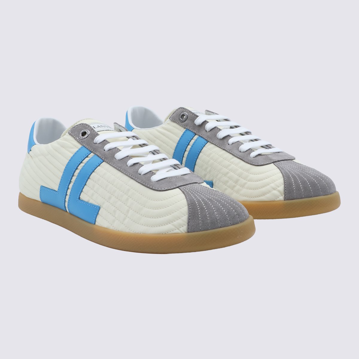 Quilted Off-White Sneakers with Light Blue Accents