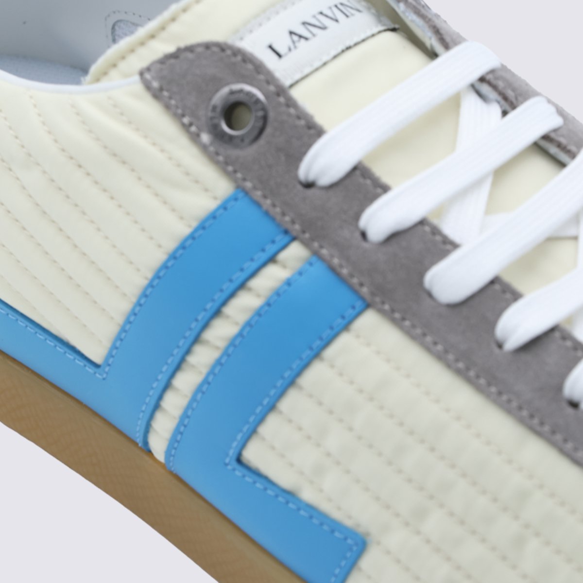 Quilted Cream Sneakers with Light Blue Accents