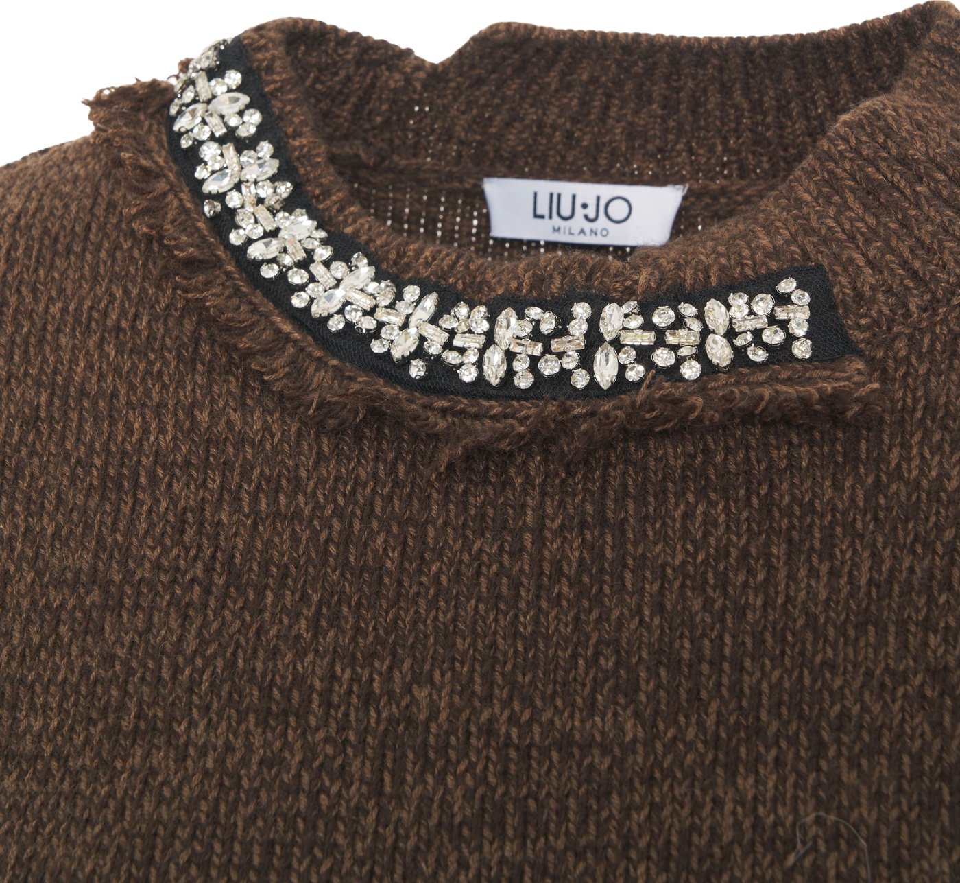 Sweater with rhinestone application