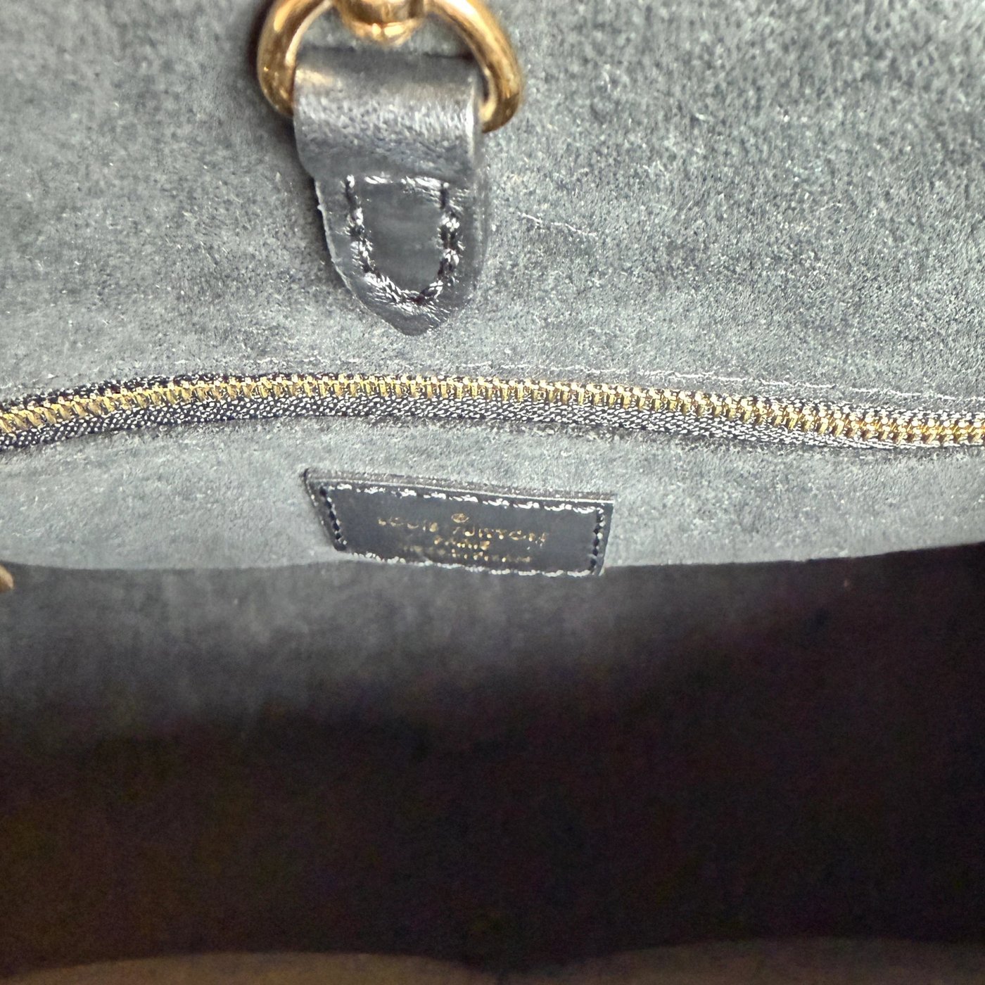 Louis Vuitton OnTheGo PM Monogram Empreinte Leather Black Gold