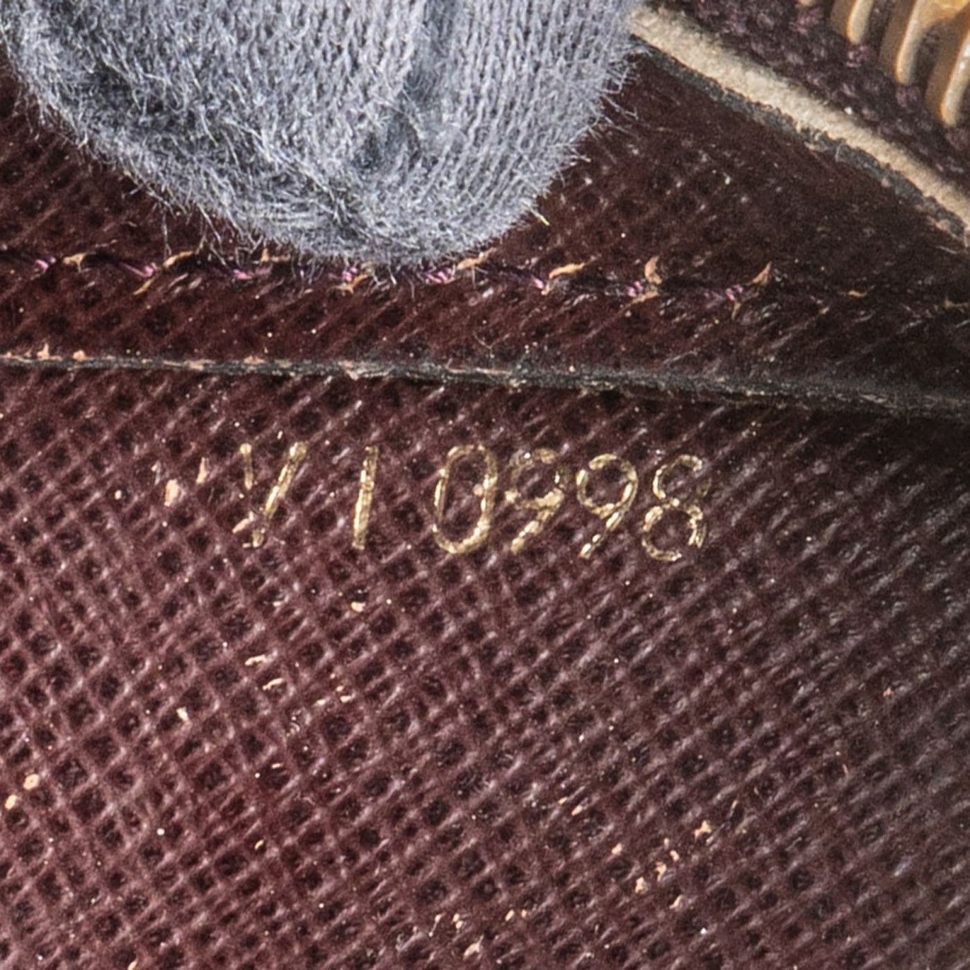 Louis Vuitton Taiga Leather Pochette Baikal Handbag