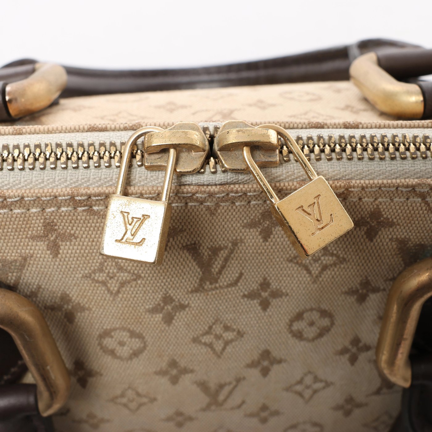 Louis Vuitton Alma Long Mini Lin Handbag in Beige x Brown