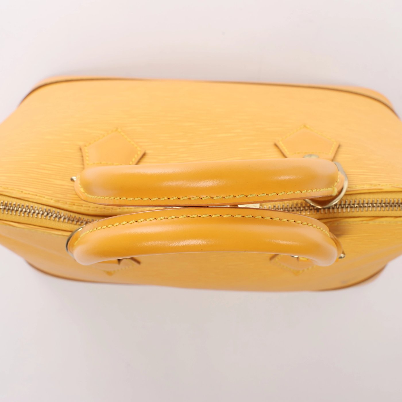 Louis Vuitton Alma Epi Leather Handbag in Yellow M52149
