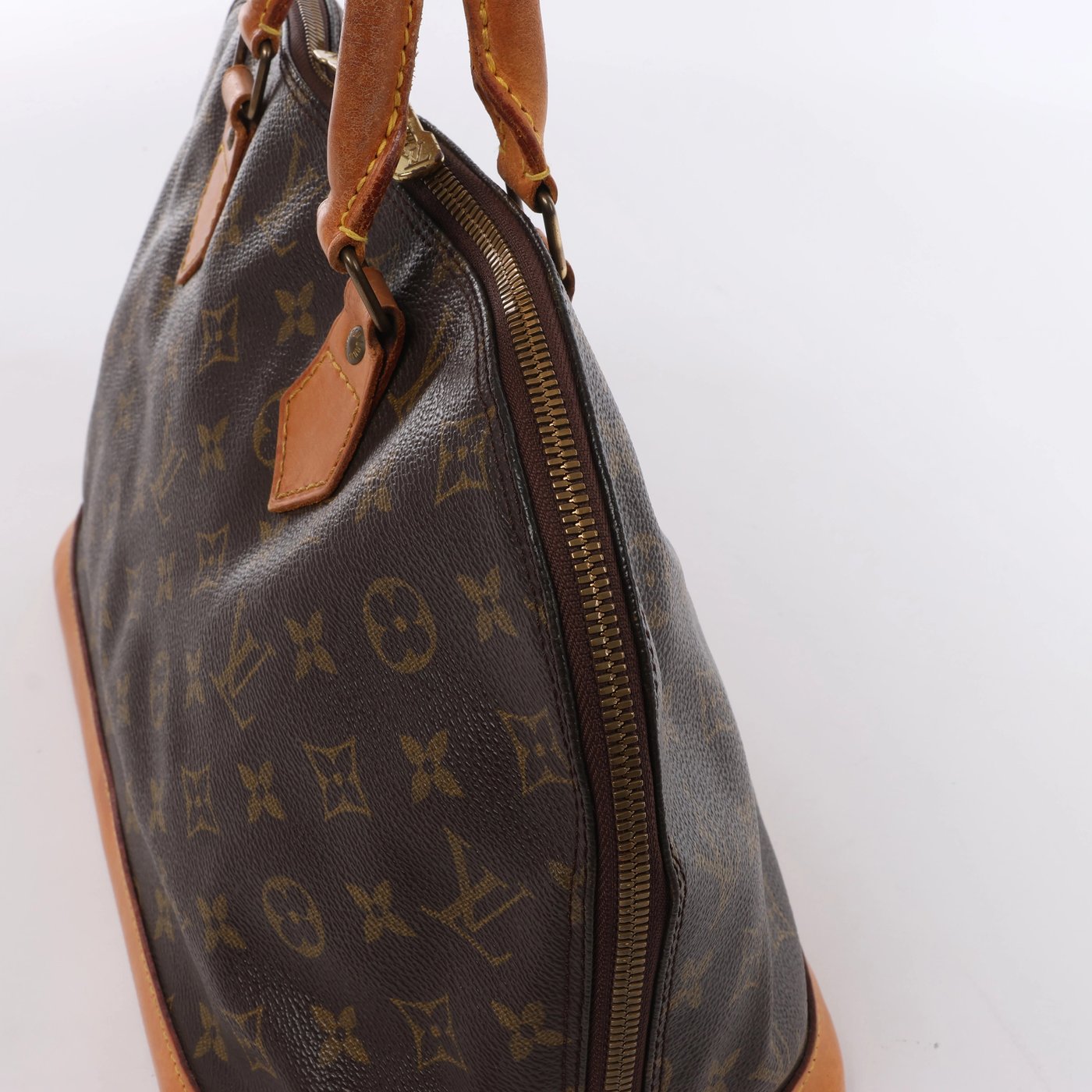 Louis Vuitton Alma PM Monogram Canvas Handbag in Brown M51130
