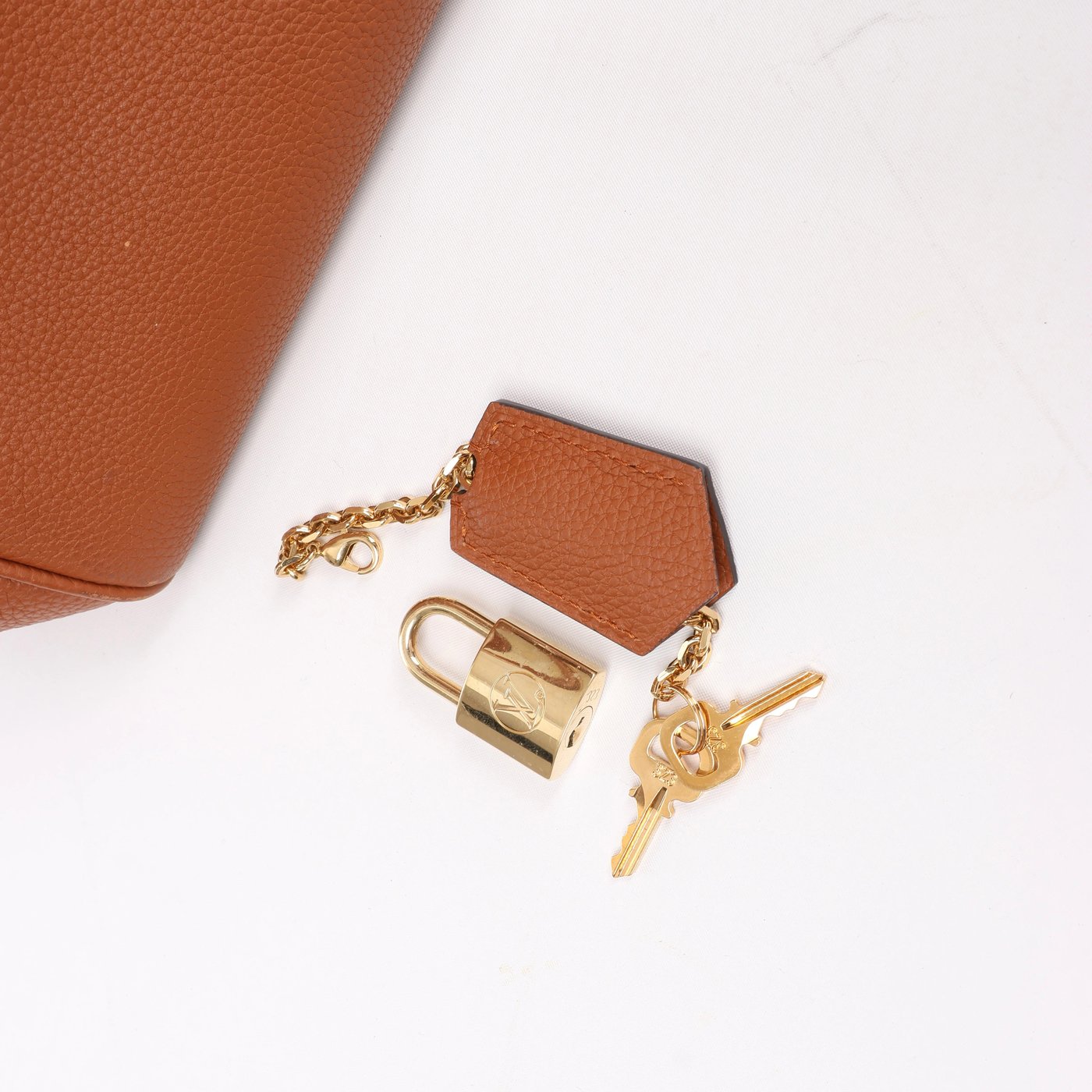 Louis Vuitton Milla PM Taurillon Handbag in Brown M51684