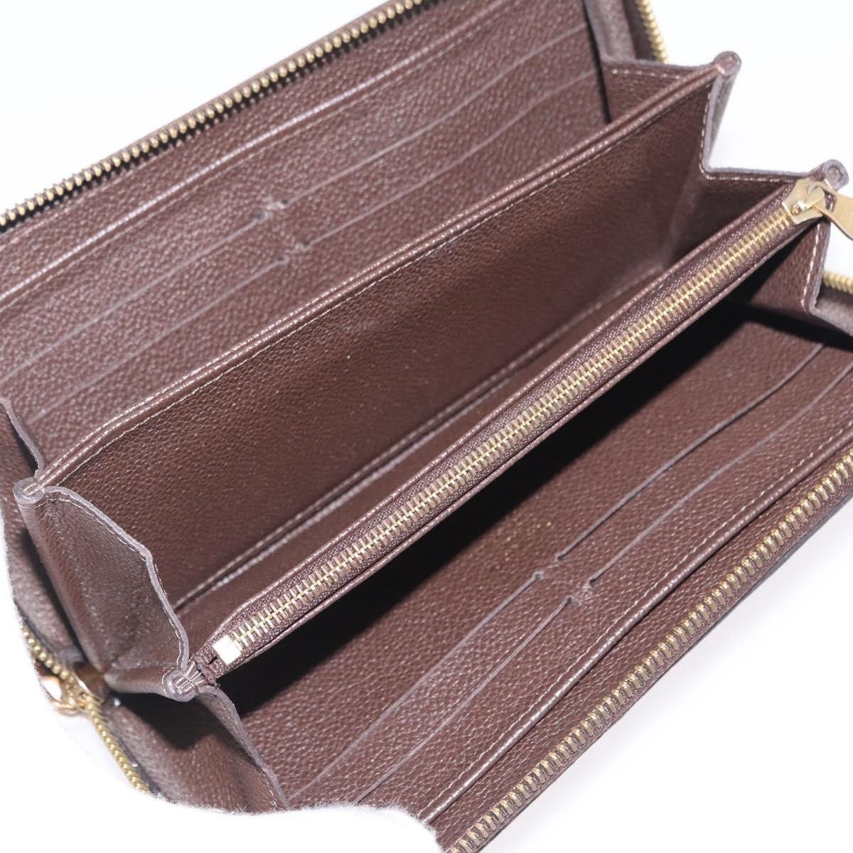 Louis Vuitton Portefeuille zippy Monogramme Empreinte monogramme empreinte