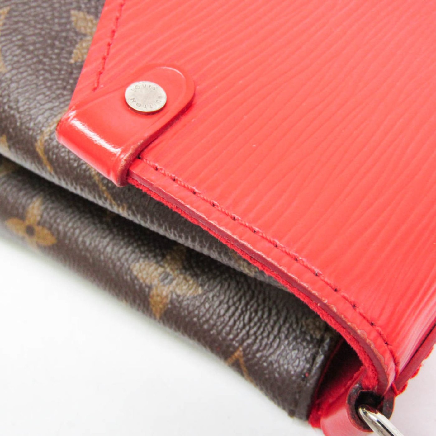Louis Vuitton Saint Michel Monogram Canvas and Epi Leather