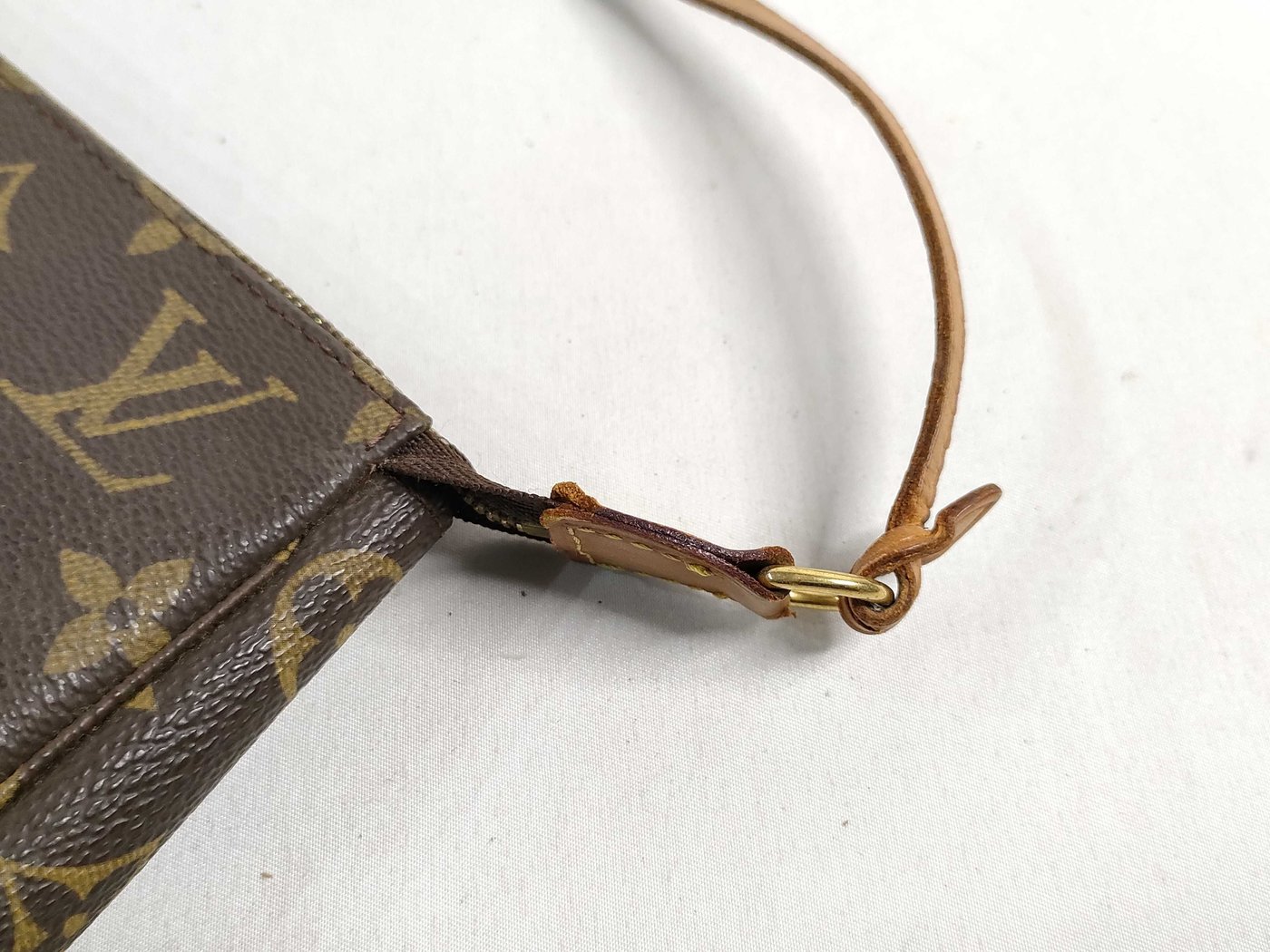 Louis Vuitton Randonnee Pochette Monogram Coated Canvas