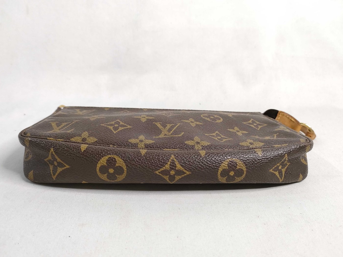 Louis Vuitton Randonnee Pochette Monogram Coated Canvas