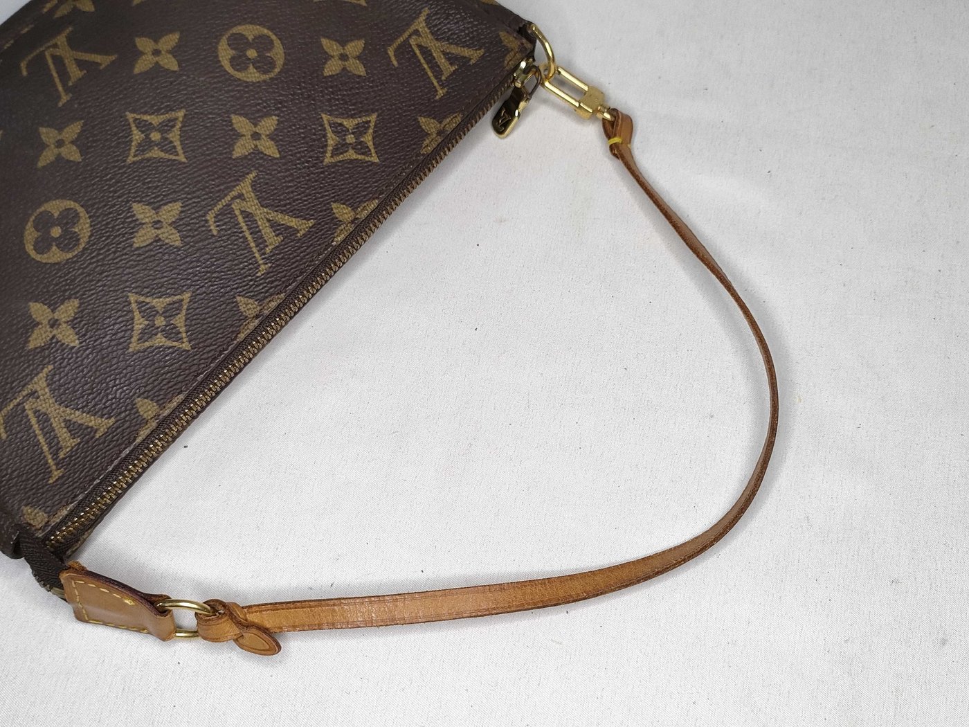 Louis Vuitton Randonnee Pochette Monogram Coated Canvas