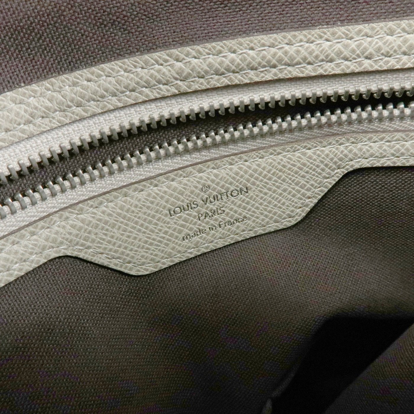 Louis Vuitton Milo Messenger Taiga Leather