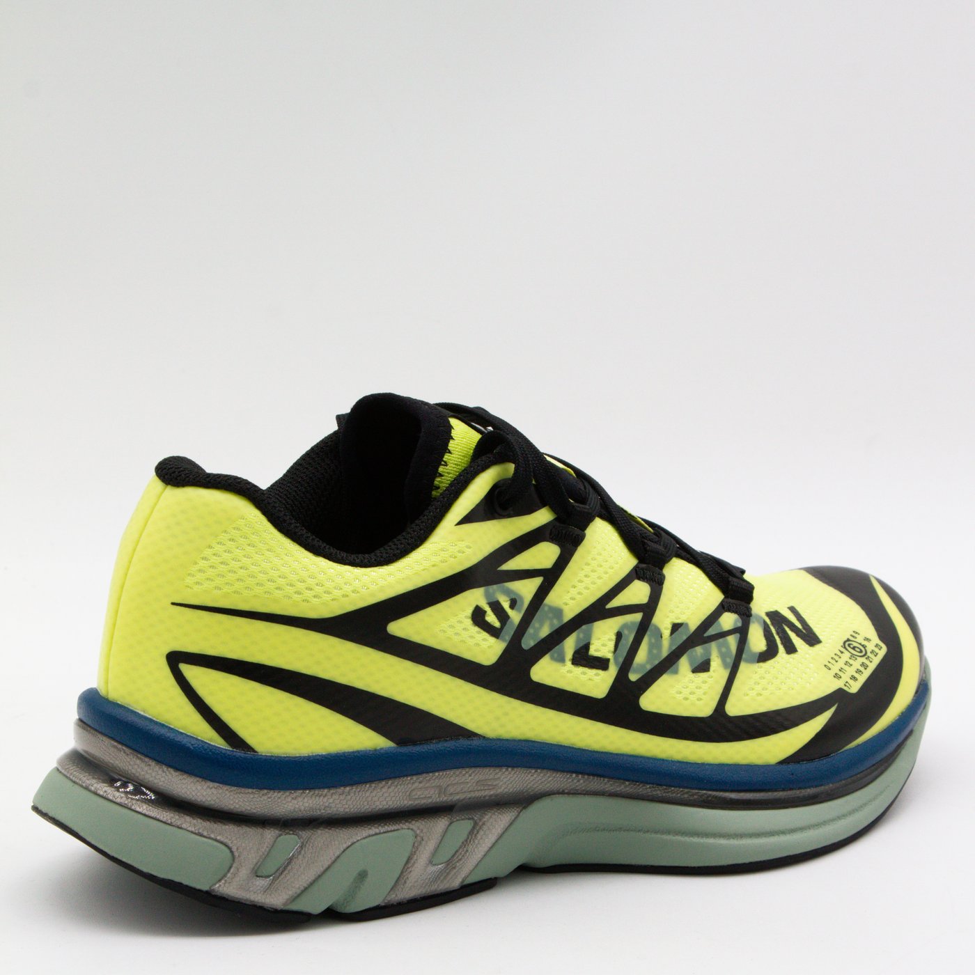 Neon Yellow Mesh Sneakers With Geometric Overlays