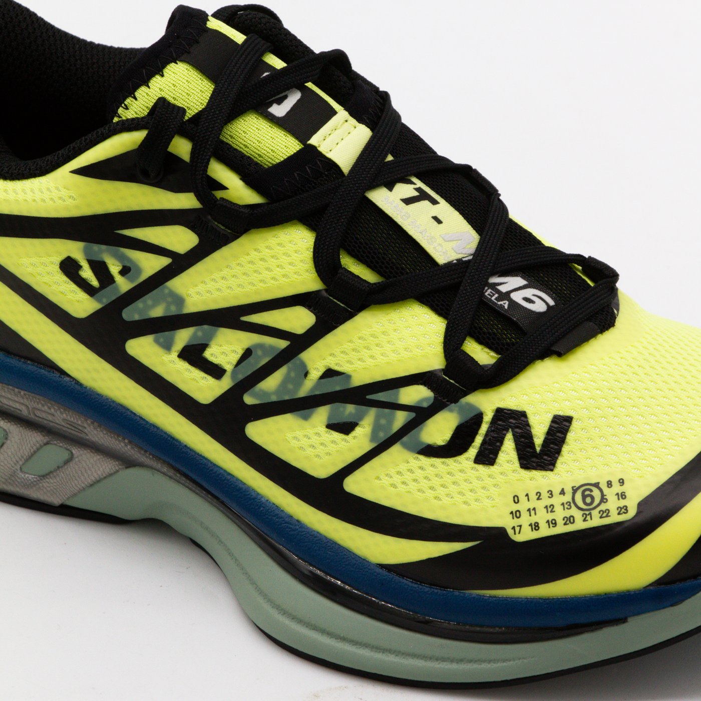 Neon Yellow Mesh Sneakers With Geometric Overlays