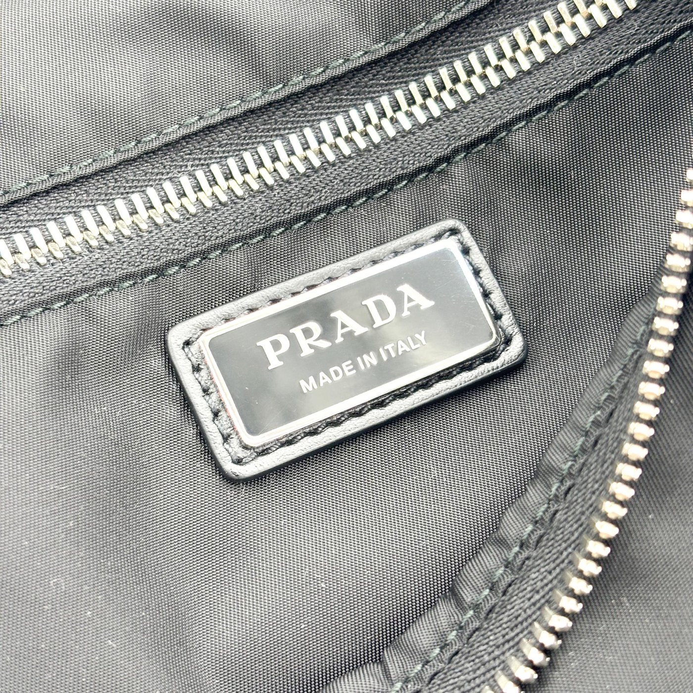 Prada Triangle Zip Sling Re-Nylon with Leather
