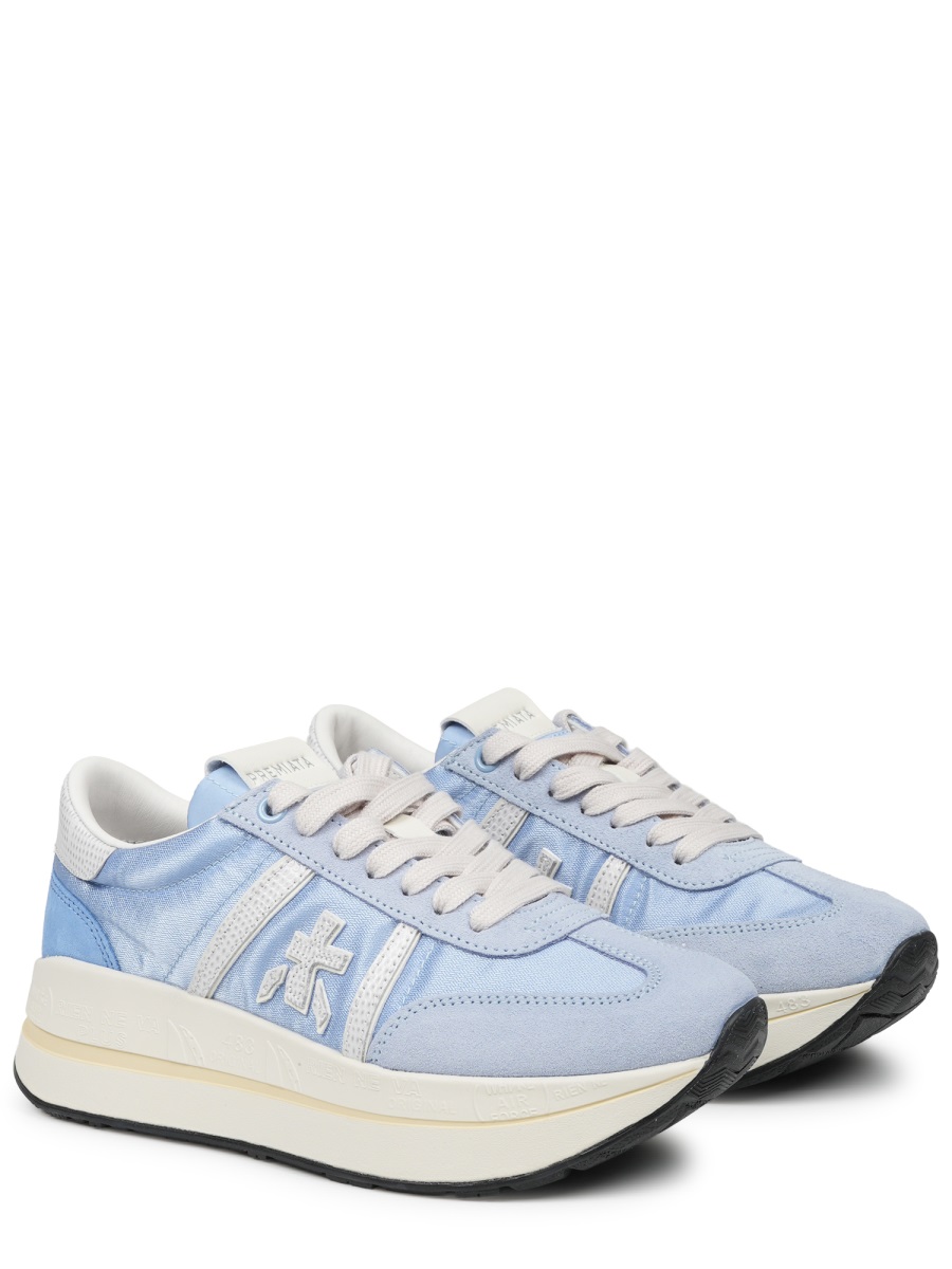 Soft Blue Sneakers with Distinctive Logo and Contrasting Outsole