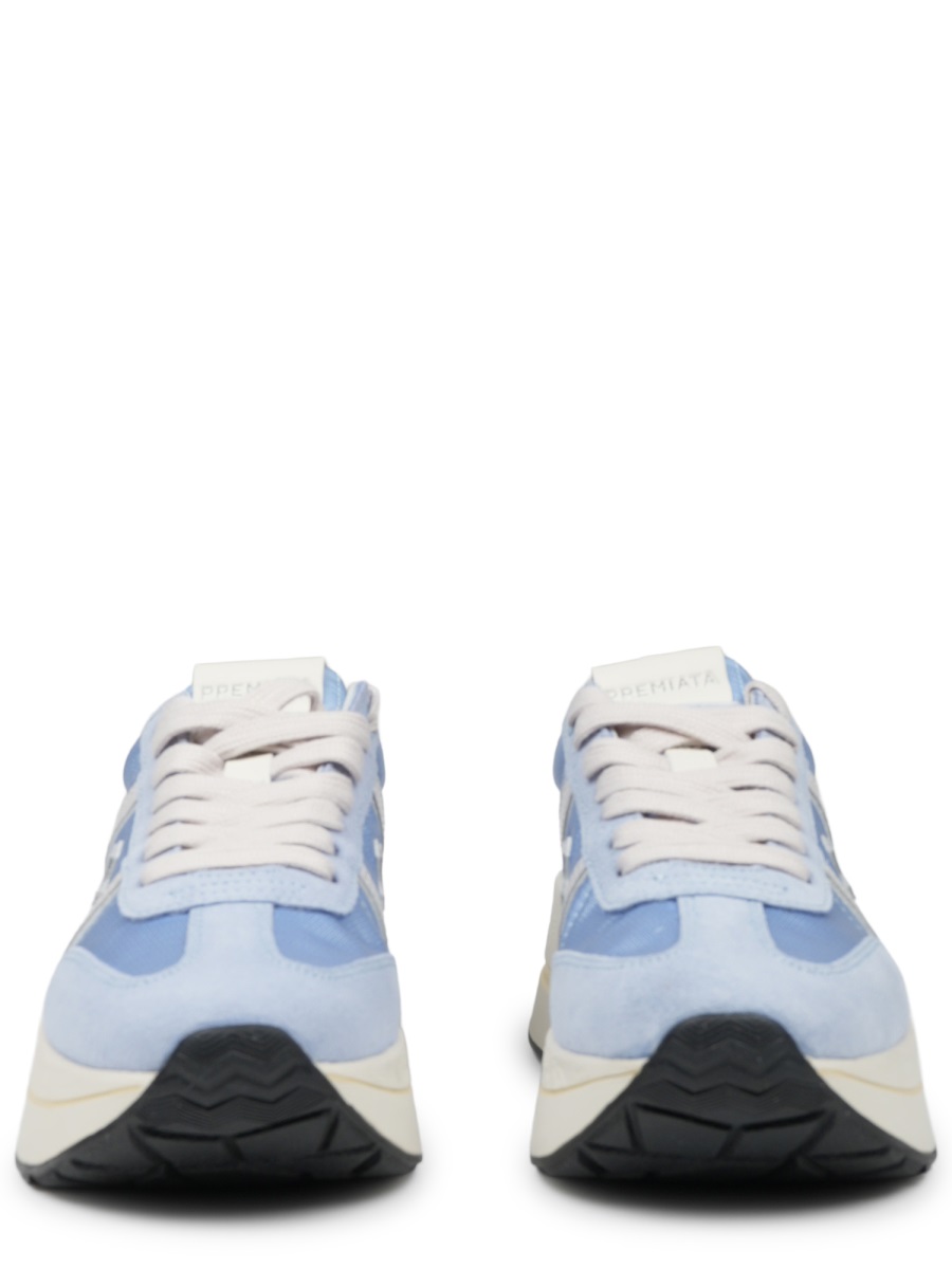 Soft Blue Sneakers with Distinctive Logo and Contrasting Outsole