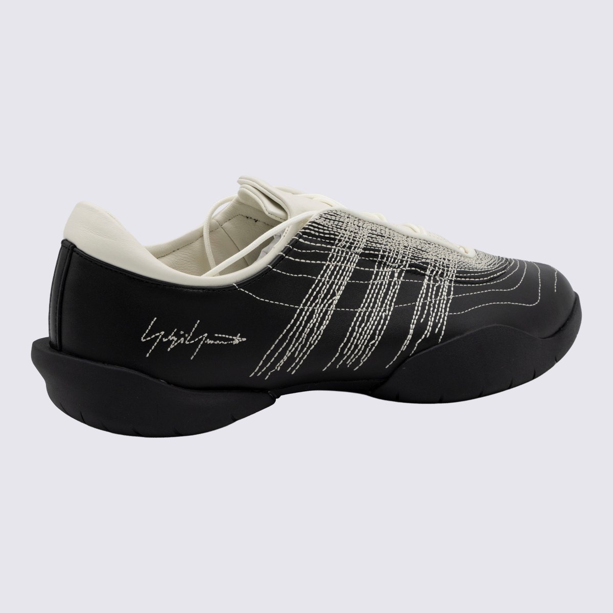 Low-Profile Sneakers with Textured Stitching and Signature Detail
