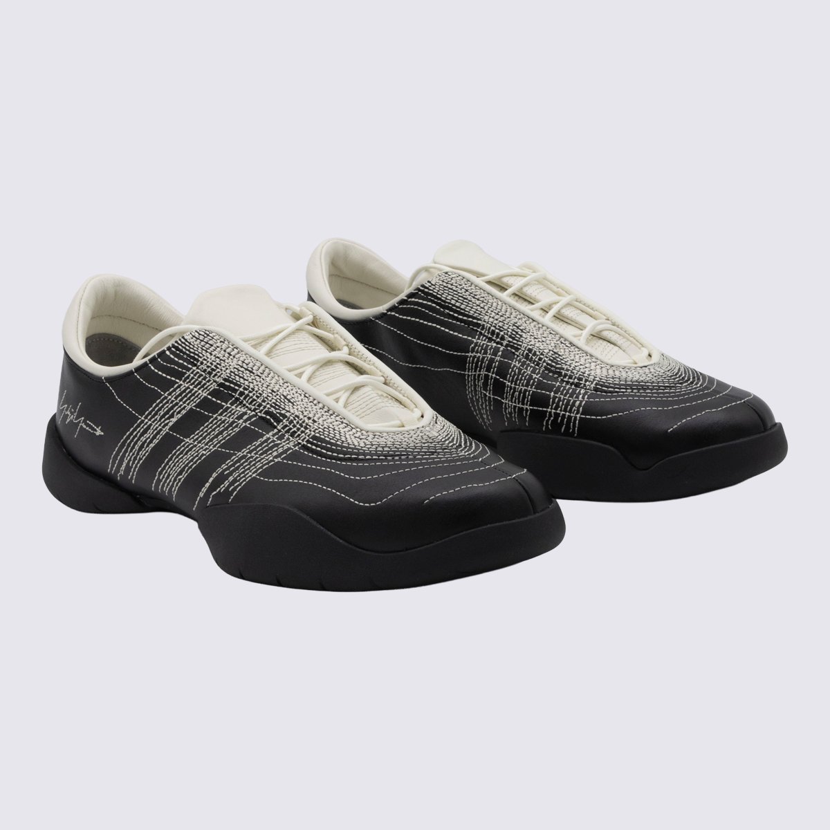 Low-Profile Sneakers with Textured Stitching and Signature Detail