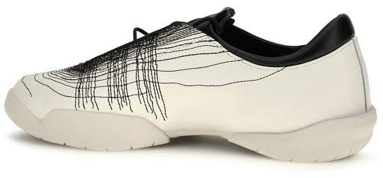 Minimalist White Sneakers with Intricate Black Patterns