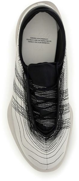 Minimalist White Sneakers with Intricate Black Patterns