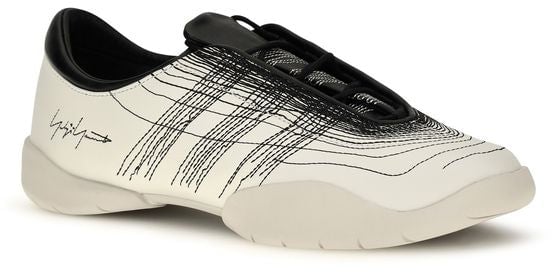 Minimalist White Sneakers with Intricate Black Patterns