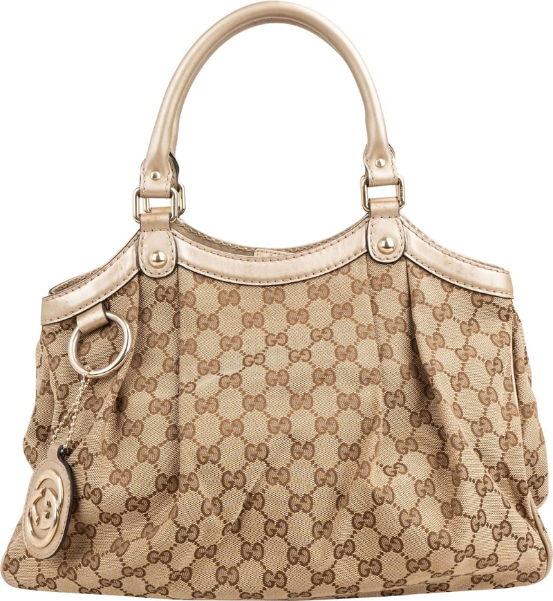 Gucci Monogram GG Canvas Metallic Leather Sukey Handbag