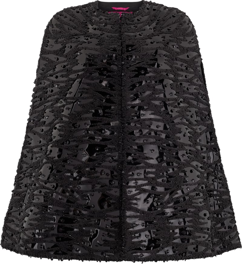 Silk cape with tailored applications and hand-stitched applications